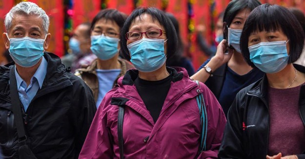 Pekin'de Maskesiz Gezene Gözaltı